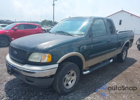2002 Ford F150 из США, поврежденный, VIN 1FTRX18W02KA29930